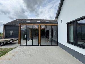Project in Ottoland: Stalen pui met enkele deur onder overkapping 4 IMG 8763